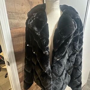 Black fur jacket with rhinestone accents